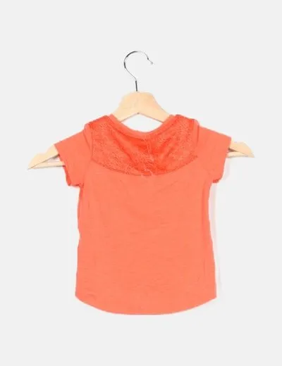 Decathlon Camiseta naranja detalle cuello