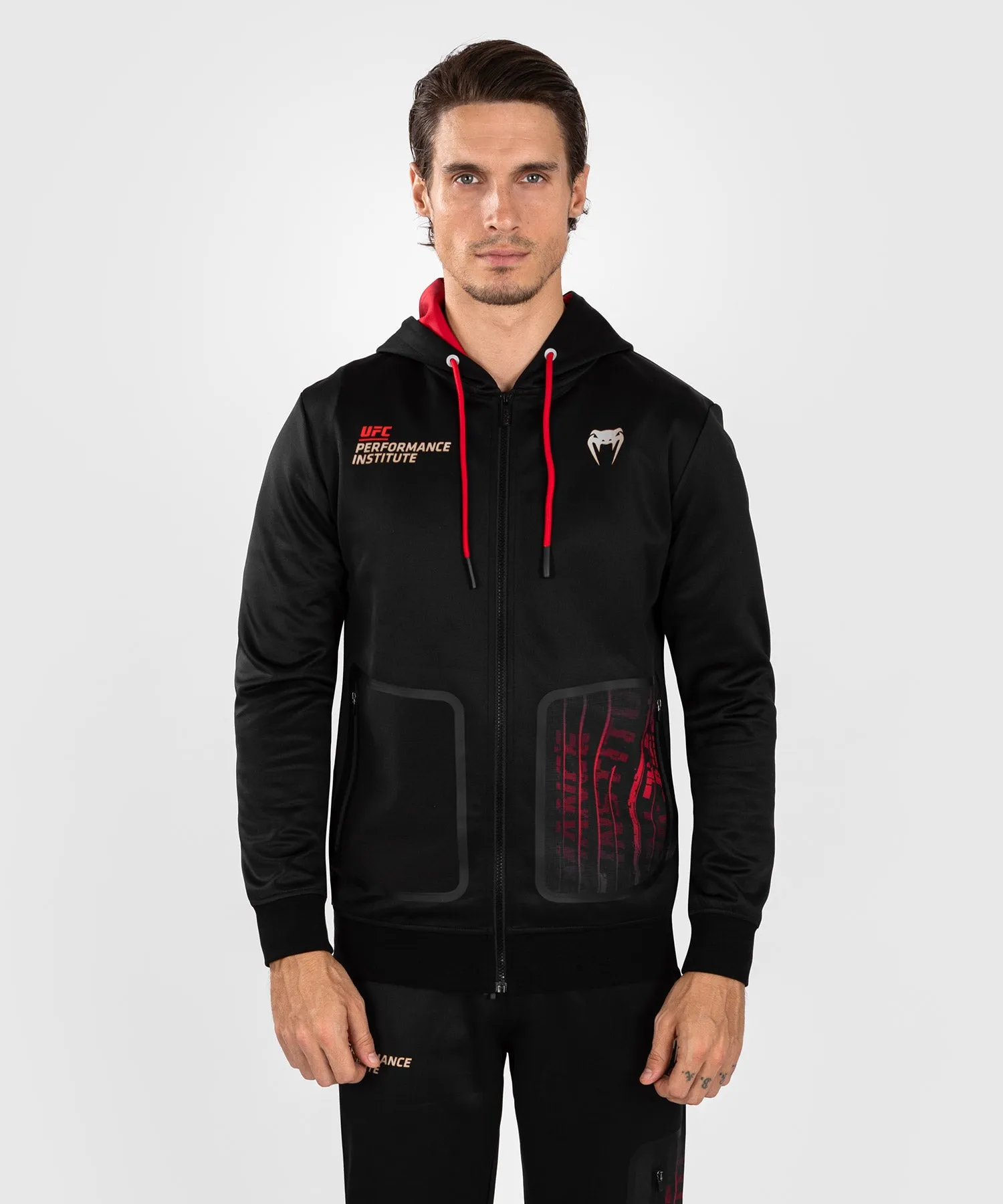 UFC Venum Performance Institute 2.0 Sudadera con cremallera para hombre - Negra/Roja