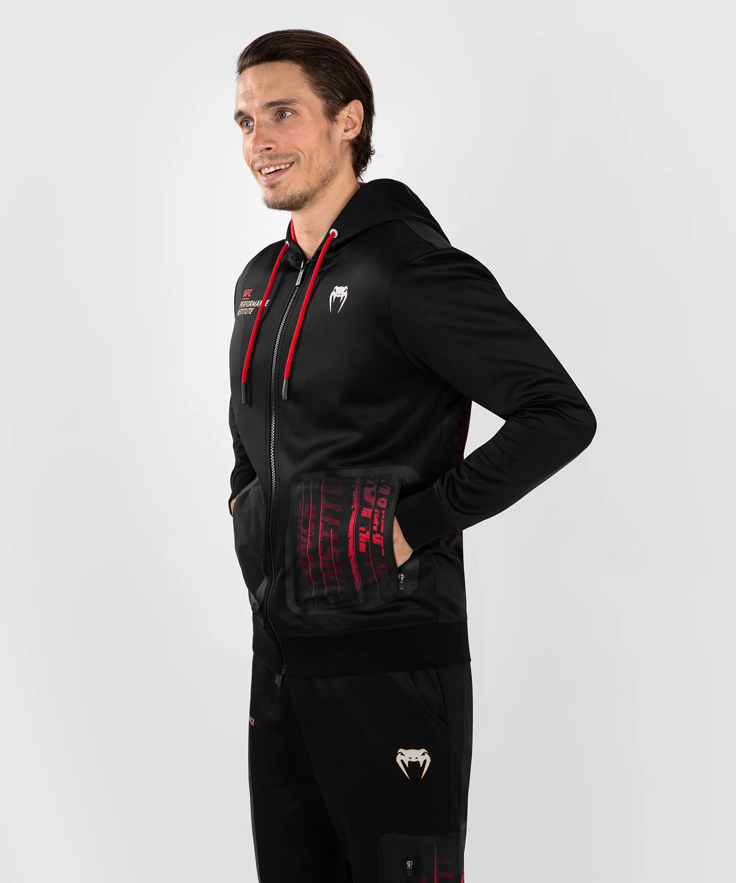 UFC Venum Performance Institute 2.0 Sudadera con cremallera para hombre - Negra/Roja