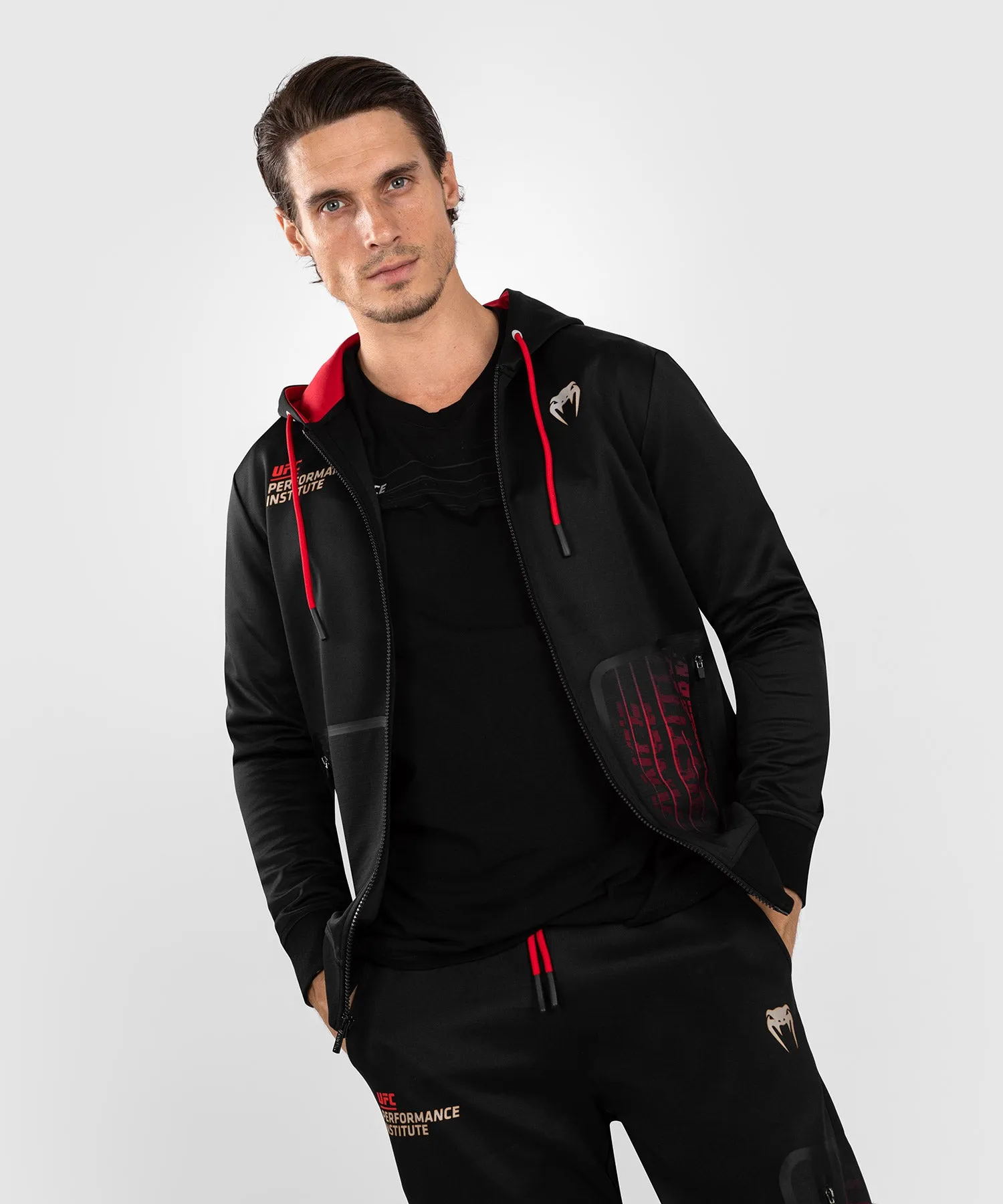 UFC Venum Performance Institute 2.0 Sudadera con cremallera para hombre - Negra/Roja