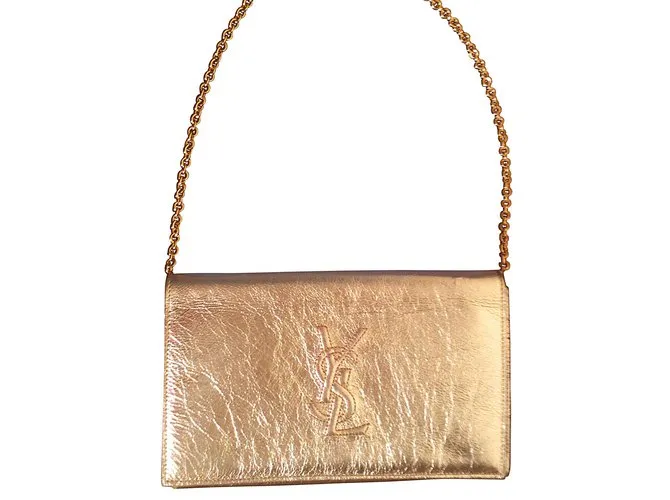 Yves Saint Laurent Bolsos de mano Dorado 